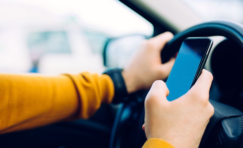 texting-while-driving-small.2110281635550-2