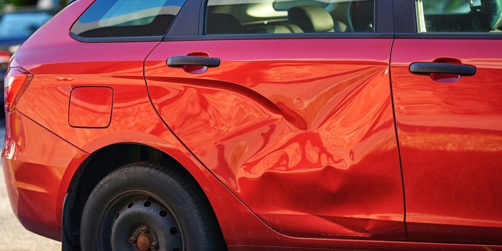 Dented,Door,Of,Car,After,Accident,,Collision,Impact,On,Vehicle. pennsylvania motor vehicle accident lawyer